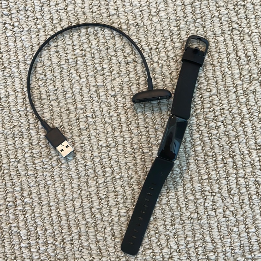 Fitbit and charger, used handful of times